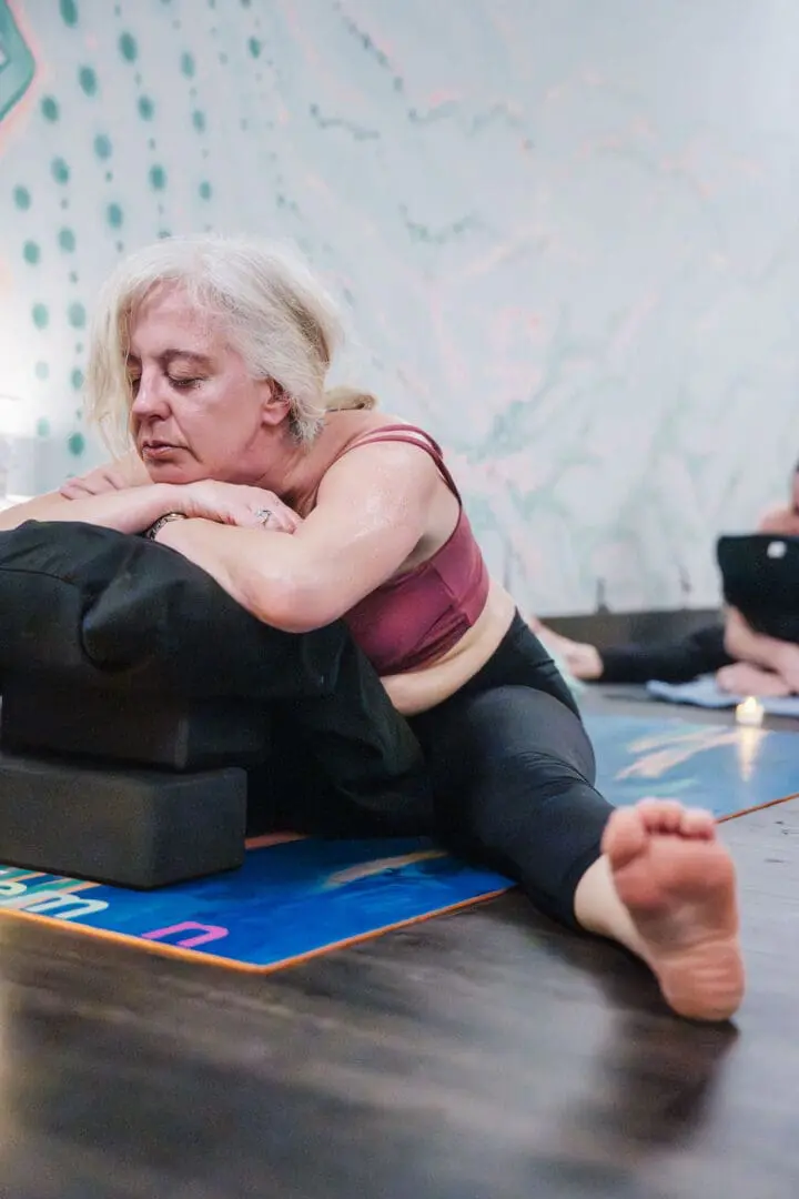 Teacher-led hot yoga class at Vitara Hot Yoga in Seabrook NH