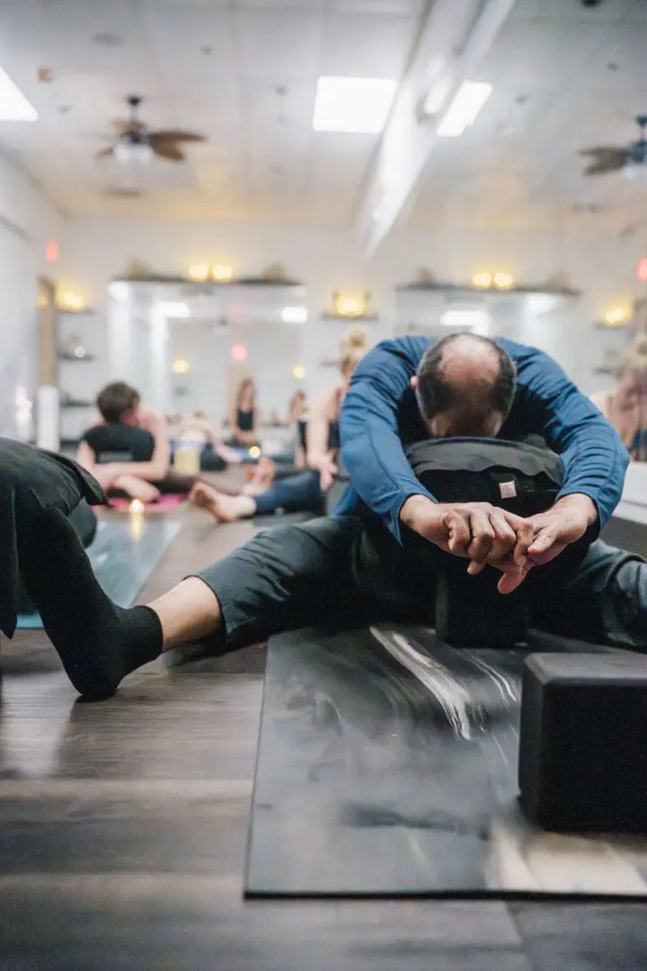 Students practicing hot yoga at Vitara Hot Yoga in Seabrook NH
