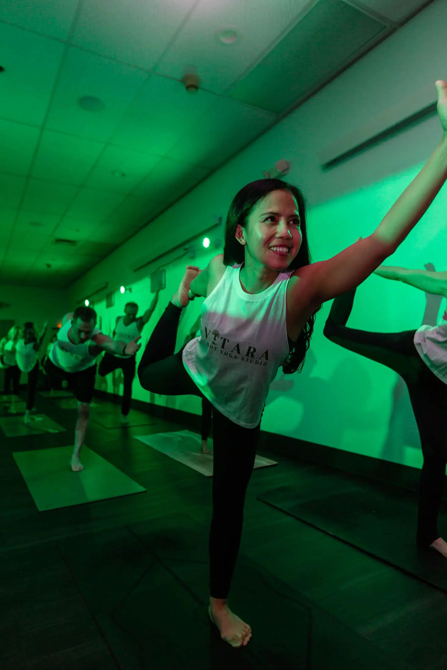 Vitara Hot Yoga teacher welcoming students in Seacoast New Hampshire