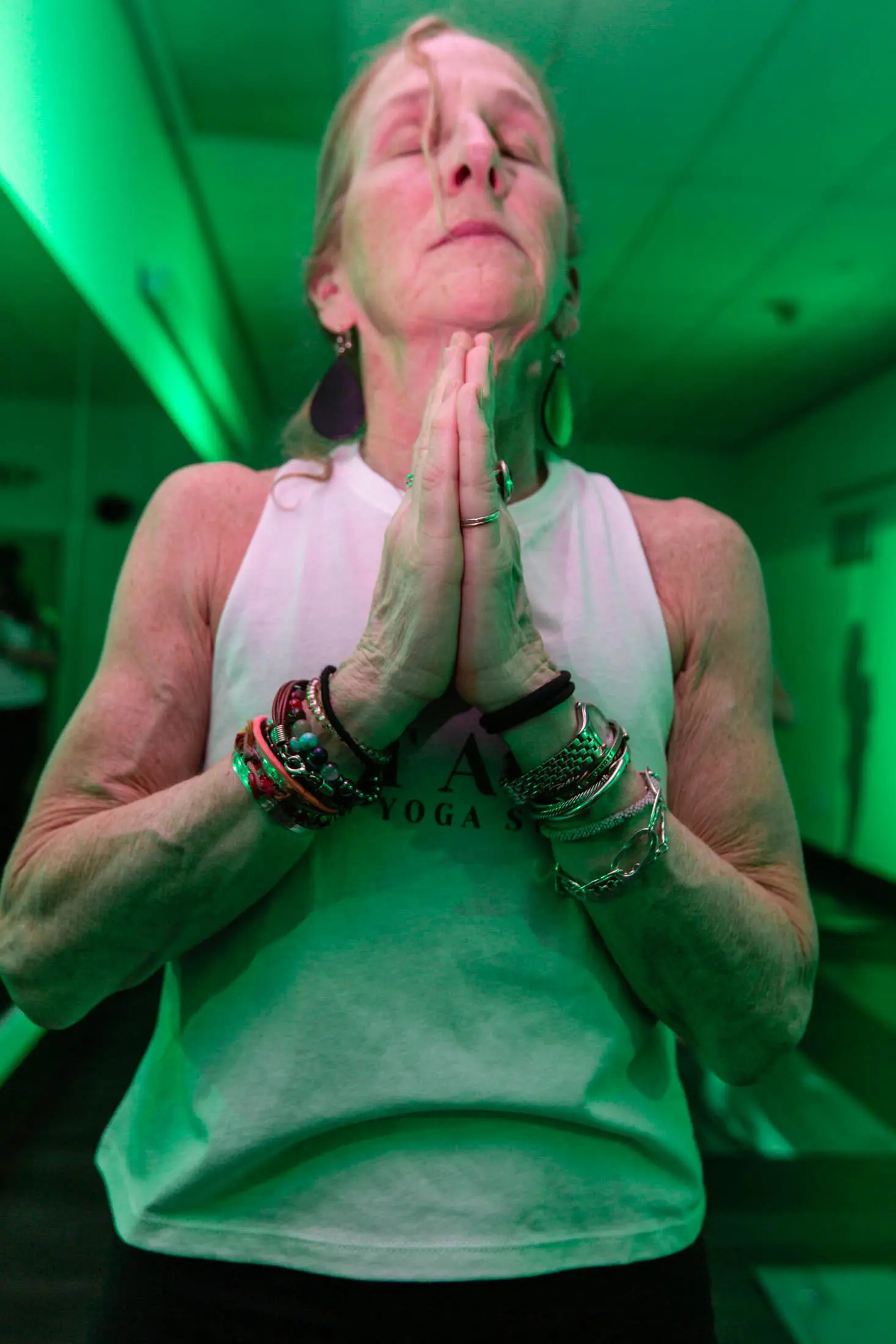 Vitara Hot Yoga teacher guiding a class in the Seacoast NH studio
