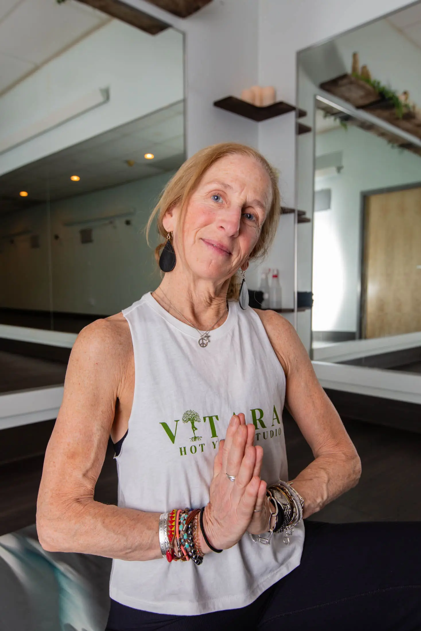 Vitara Hot Yoga teacher welcoming students in Seacoast New Hampshire