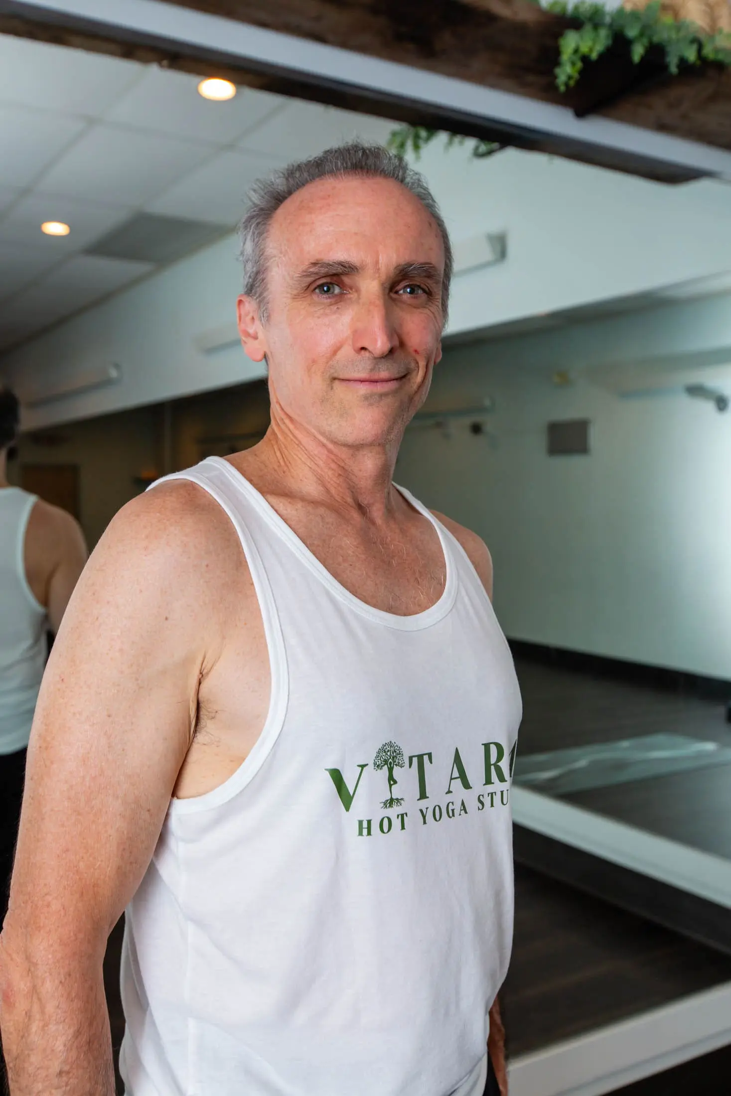 Vitara Hot Yoga teacher guiding students in Seacoast New Hampshire